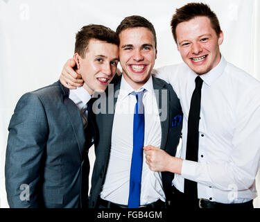 Young smart males at a teenage prom for teenagers to mark coming of age in UK Stock Photo