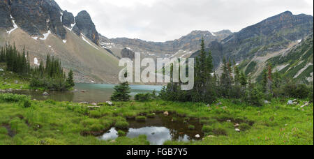 Panoramic view: Gorman Lake is a beautiful alpine lake in the heart of the Canadian Rockies, and not too difficult of a hike. Ne Stock Photo
