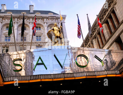 Exterior view of luxury Five-Star Savoy Hotel entrance foyer The Strand London WC2 Stock Photo