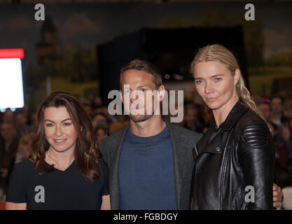 Suzi Perry, Jenson Button and Jodie Kidd pose for the press,  after the Classic Six Nations Cup Opening Ceremony on media day at the London Classic Car Show 2016 Stock Photo