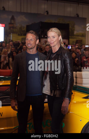 Jenson Button and Jodie Kidd pose for the press infront of a McLaran F1, on media day, at the London Classic Car Show 2016 Stock Photo