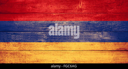 flag of  Armenia or  Armenian banner on wooden background Stock Photo