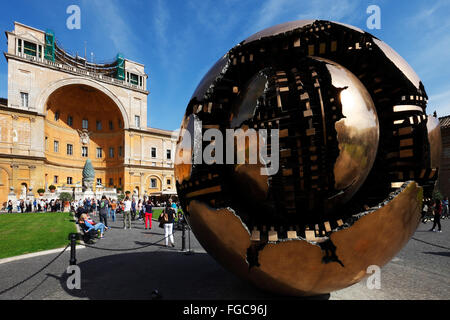 Sphere sculpture by Pomodoro in the Cortile della Pigna, Vatican Museum Gardens, Rome, Lazio, Italy Stock Photo