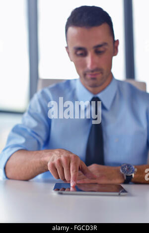 business man using tablet compuer at office Stock Photo