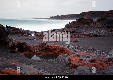 Coastline with black sand, Djupalonssandur, Hellnar, Snaefellsnes peninsula, Iceland Stock Photo