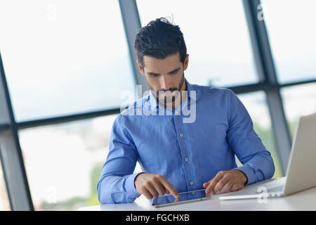business man using tablet compuer at office Stock Photo