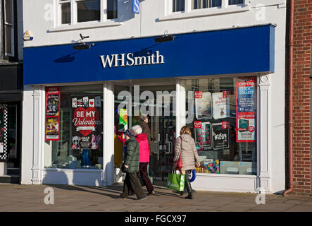 People shopping shoppers outside WH Smith WHSmith shop store Ripon North Yorkshire England UK United Kingdom GB Great Britain Stock Photo