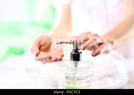 Homemade treatments for hands and nails. Creamy soap, clean skin. Wash your hands !. A woman washes her hands Stock Photo