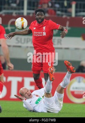 Augsburg, Germany. 18th February, 2016. Kolo TOURE, LIV 4 in action against Tobias WERNER, FCA 13   during the UEFA Europa League Round of 32: First Leg match FC Augsburg - Liverpool 0-0 on February 18, 2016 in Augsburg, Germany. Credit:  Peter Schatz / Alamy Live News Stock Photo