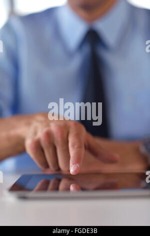 business man using tablet compuer at office Stock Photo