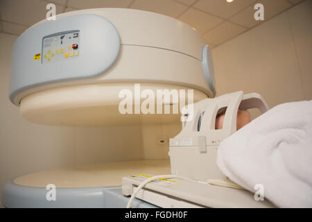 Patient being scanned and diagnosed on a computed tomography
