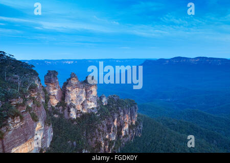 The Three Sisters rock formation in the Blue Mountains, New South Wales, Australia. Photographed at dusk. Stock Photo