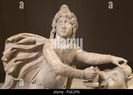 The Roman cult of Mithras. Tauroctony. Mithras killing the bull. Marble. Roman statue. Louvre Museum. Paris. France. Stock Photo