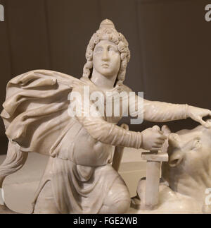 The Roman cult of Mithras. Tauroctony. Mithras killing the bull. Marble. Roman statue. Louvre Museum. Paris. France. Stock Photo