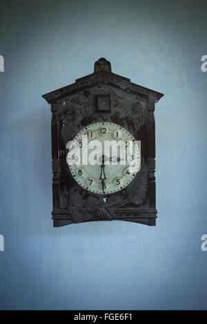 Antique cuckoo clock on wall Stock Photo