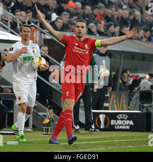 Augsburg's  Markus Feulner (L) and Liverpool's Jordan Henderson react during the UEFA Europa League match between FC Augsburg and FC Liverpool at WWK-Arena in Augsburg, Germany, 18 February 2016. Photo: Stefan Puchner/dpa Stock Photo