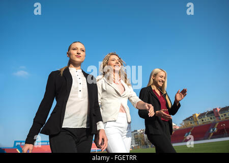 business people running on racing track Stock Photo