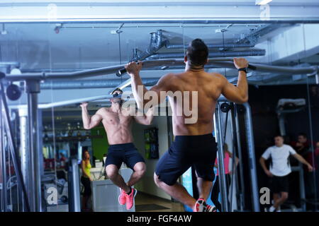 handsome man exercising at the gym Stock Photo