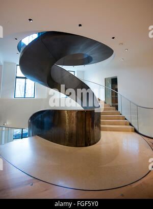 Spiral staircase inside the building that houses the Wellcome Collection, London England UK Stock Photo