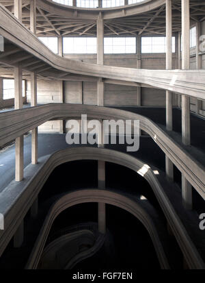 Lingotto building garage ramp in Torino Italy, built in 20s/30s. Details of the spiral style ramp that goes to roof top. Stock Photo