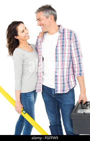Couple with toolbox and bubble level Stock Photo