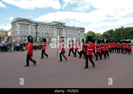 Guards leaving Buckingham Palace following the Changing of the Guard ceremony in London, UK. Stock Photo