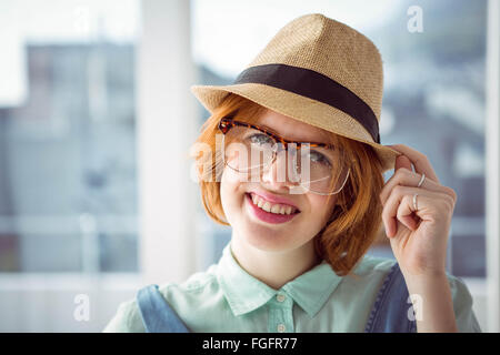 Cute red haired hipster with glasses Stock Photo