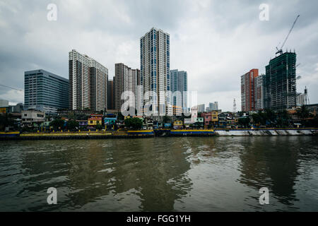 Buildings in Mandaluyong and the Pasig River, in Makati, Metro Manila, The Philippines.