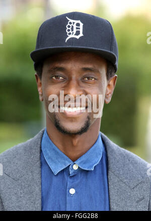 'Twilight' and 'X-Men' actor Edi Gathegi seen engrossed in a phone call while out in Beverly Hills, and then joined by his girlfriend Courtney B. Turk  Featuring: Edi Gathegi Where: Los Angeles, California, United States When: 15 Jan 2016 Stock Photo