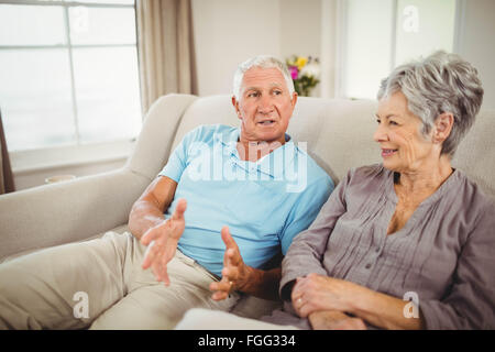 Senior couple having a discussion Stock Photo