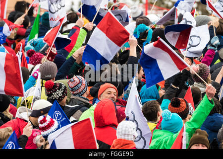 Chamonix, France. 19th February, 2016. Fans react to the arrival of Alexis Pinterault at the finish of the men's downhill course in Chamonix. The Men's Alpine Combined event (downhill and slalom) ended with the downhill section of the race last due to weather conditions (heavy snow) earlier in Chamonix. The race began at 15.15h on a shortened course after a further hour of delay. The podium was - 1- PINTURAULT Alexis (FRA) 2:13.29 2- PARIS Dominik (ITA) 2:13.56 3-MERMILLOD BLONDIN Thomas (FRA) 2:13. Credit:  Genyphyr Novak/Alamy Live News Stock Photo