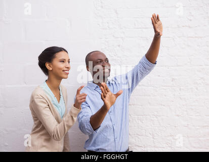 Businessman explains something to his colleague Stock Photo