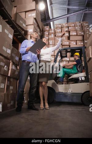 Warehouse team working together Stock Photo