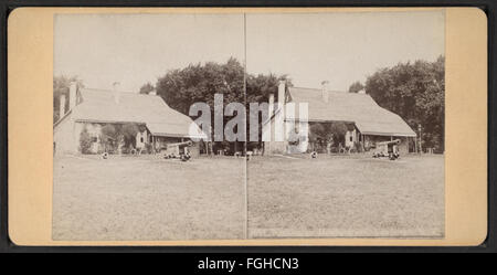 Rear view of Washington's Headquarters in Newburgh, New York, with a cannon visible in the foreground. Captured as part of the Robert N. Dennis stereoscopic views collection. Stock Photo
