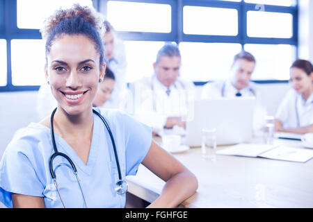 Portrait of female doctors smiling at camera Stock Photo