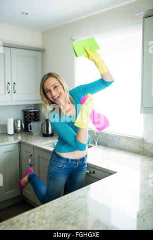Pretty woman doing her house chores Stock Photo