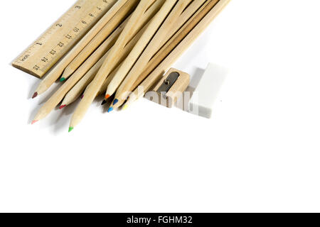 pencil, eraser, sharpener, wood ruler on white background Stock Photo