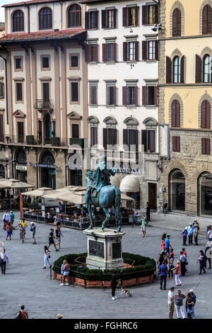 FLORENCE, ITALY - SEPTEMBER 22, 2015 : View of Piazza Della Signoria in Florence, with people and sculptures around. Stock Photo