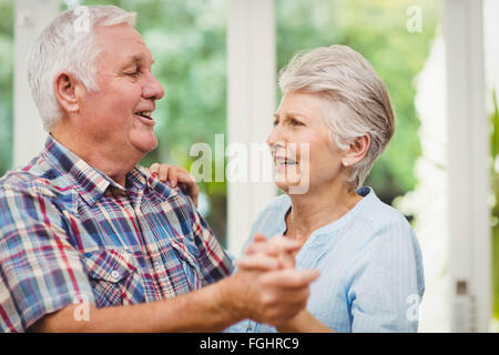 Happy senior couple dancing Stock Photo