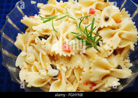 Close Up of Fresh Rosemary on Top of Pasta Salad Stock Photo