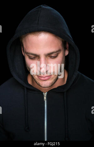 Handsome man wearing a black hoodie Stock Photo