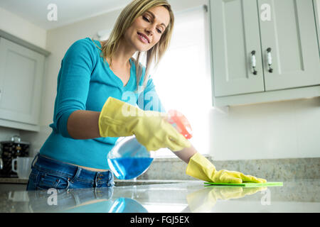 Pretty woman doing her house chores Stock Photo