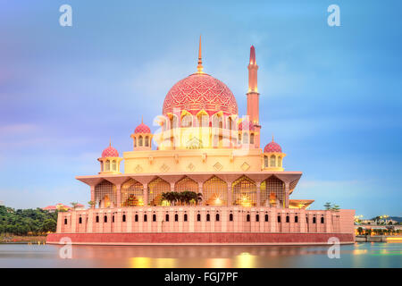 Sunset over Putrajaya Mosque and Panorama of Kuala Lumpur, Malaysia. Stock Photo