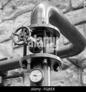 Manual valve to regulate the pressure in a brewery. Stock Photo