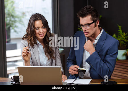 Business people working with laptop and coffee Stock Photo