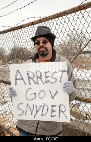 Flint, Michigan USA - 19th February 2016 - Residents marched to the Flint water treatment plant to demand the rebuilding of the city's water infrastructure. Many called for the resignation or arrest of Michigan Governor Rick Snyder. Credit:  Jim West/Alamy Live News Stock Photo