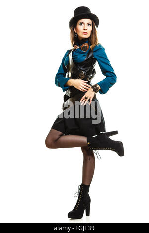 Beauty and fashion - retro style. Vintage pretty woman in black hat topper and old goggles isolated on white. Stock Photo