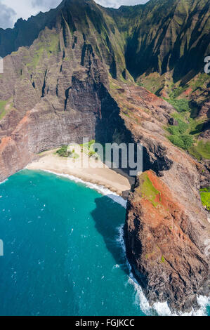 Aerial view of Honopu Arch and Kalepa Ridge on the Na Pali Coast of Kauai, Hawaii. Stock Photo