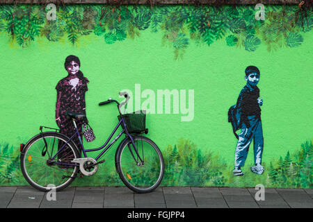 Painted wall and bicycle, street art, graffiti, Glockenbachviertel, Munich, Bavaria, Germany Stock Photo