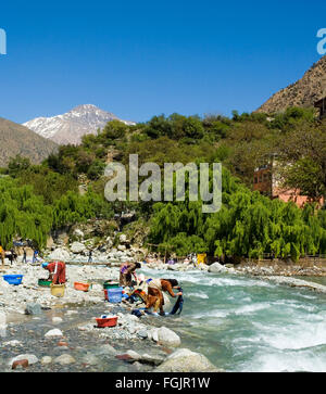 Washing Clothes in the river at Setti Fatma,  Ourika Valley, Morocco near Marrakech Stock Photo